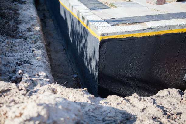 Professional Waterproofing technician working in Silver Spring, MD